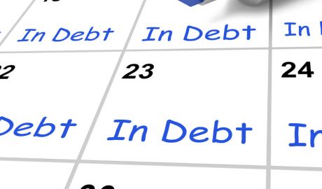 Calendar showing "In Debt" in each square