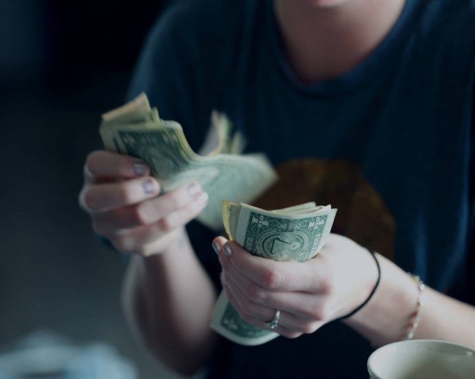 person counting money