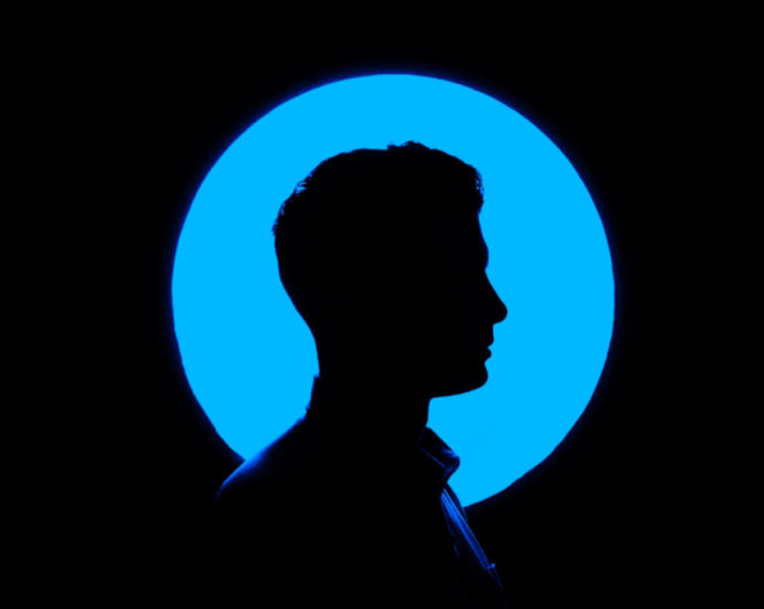 silhouette of man facing right