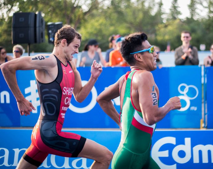 two men running a race