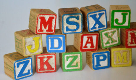 stack of old wooden letter blocks