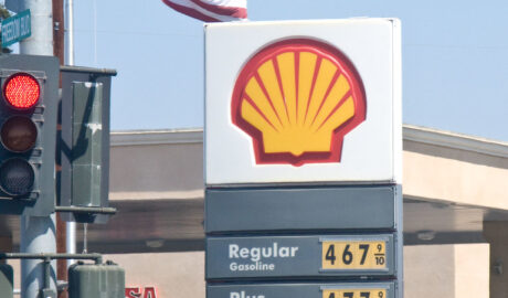 Shell Station gas sign showing high prices