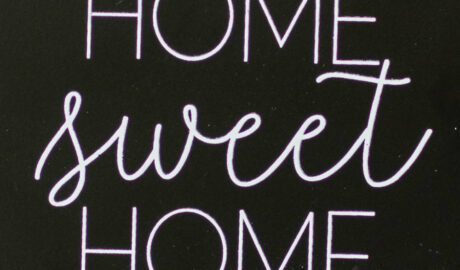 "Home sweet home" in white on black background