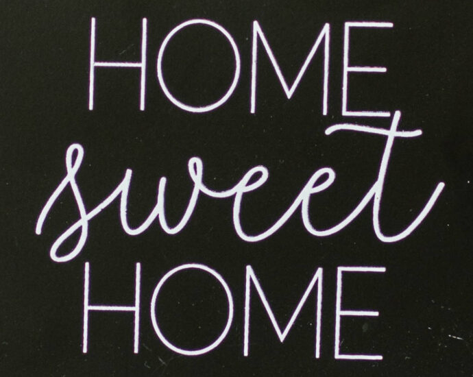 "Home sweet home" in white on black background