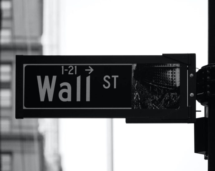 B/W street sign that says Wall Street