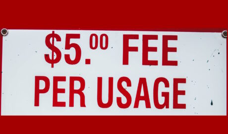 $5 Fee Per Usage sign