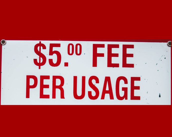 $5 Fee Per Usage sign