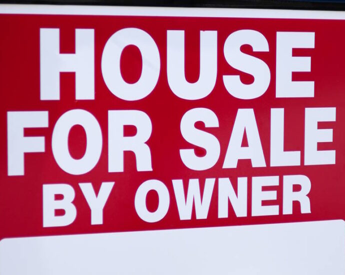 Yard sign: House for sale by owner