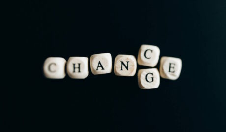 letters spelling Chance and Change (C on top of G so you can read it both ways)