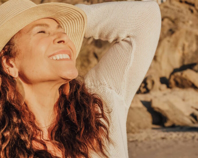 woman looking up and smiling